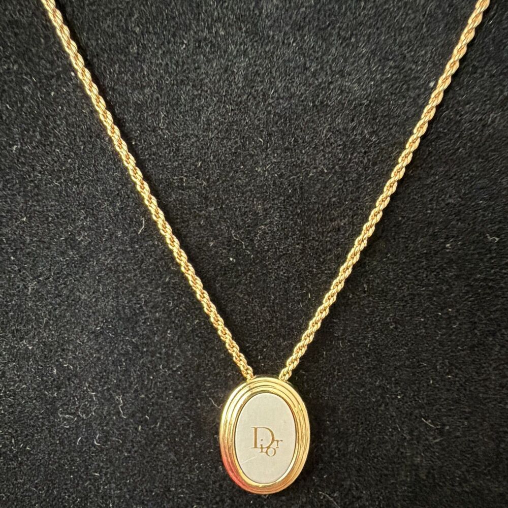 ⁠Vintage Christian Dior Two Tone Gold Oval Pendant Dior Logo Rope Chain Necklace